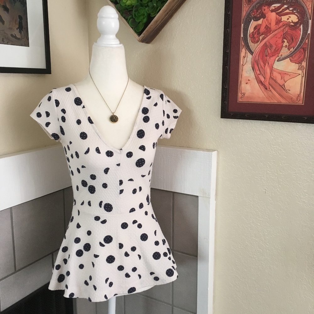 Deletta textured polka dot cap sleeve peplum top